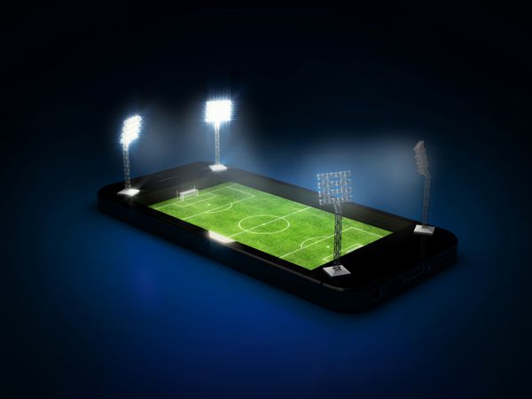 زمین فوتبال با چراغ های تلفن همراه