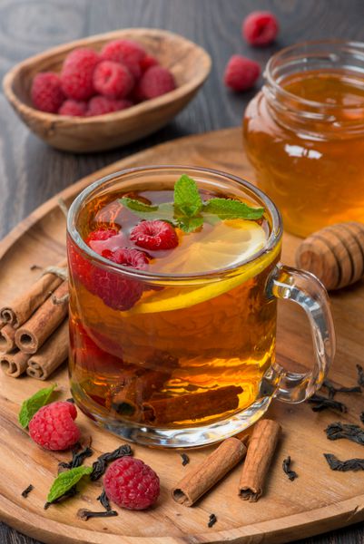 چای سیاه معطر با لیمو نعناع تمشک و دارچین