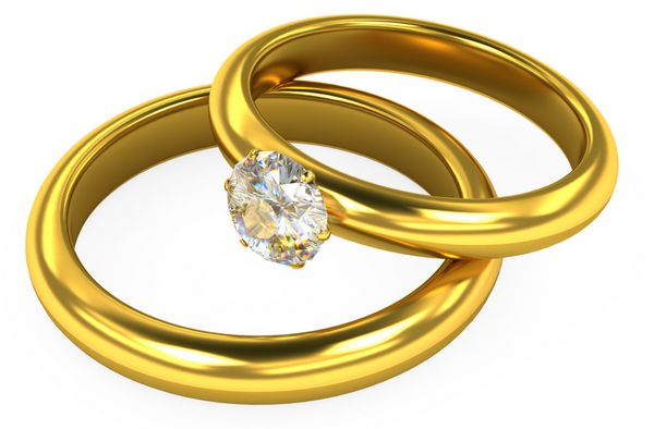 حلقه های طلای ازدواج سه بعدی در زمینه سفید