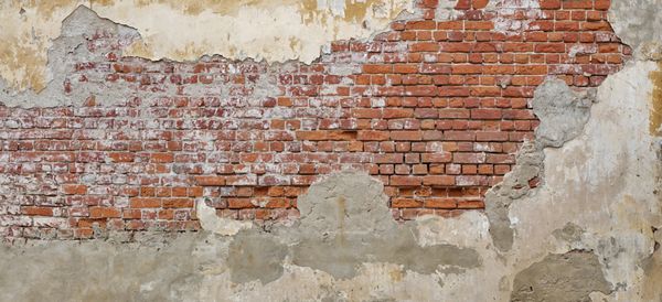 بافت خالی دیوار آجری قدیمی موج سواری دیوار پریشان رنگ شده است دیوار آجری گسترده پس زمینه سنگ گرانج قرمز نمای ساختمان فرسوده با گچ خراب بنر وب انتزاعی کپی sp