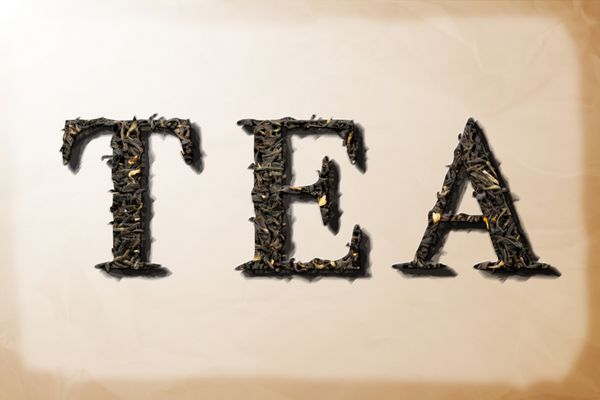 گرافیک متن چای با پس زمینه بافت کاغذی و حروف بافت برگ چای