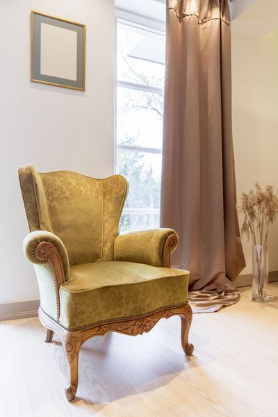 صندلی راحتی سبز رنگ به سبک کلاسیک