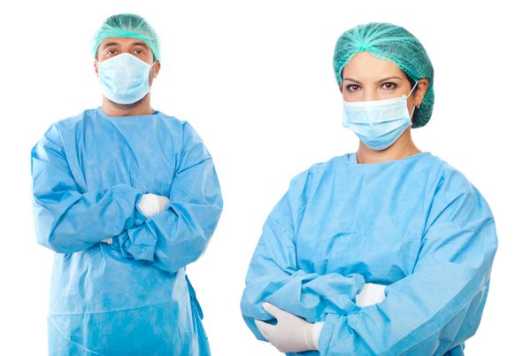 تیم جراح با لباس های محافظ