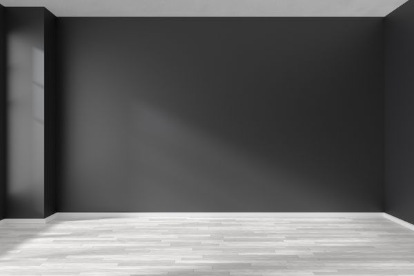 اتاق خالی سیاه و سفید با کف پارکت چوبی سفید دیوارهای سیاه و نور خورشید از پنجره روی دیوار داخلی مینیمالیستی تصویر سه بعدی