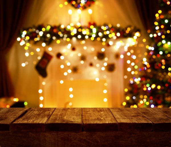 میز چوبی آشپزخانه کریسمس چراغ های شب تعطیلات کریسمس میز چوبی خالی