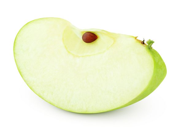 تکه سیب سبز جدا شده در پس زمینه سفید تکه ای از سیب سبز با مسیر برش