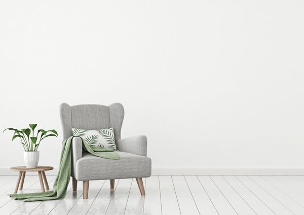 فضای داخلی ساده به سبک جنگل شهری با صندلی راحتی خاکستری چهارخانه سبز بالش با الگوی گرمسیری و گیاه در پس زمینه دیوار سفید رندر سه بعدی
