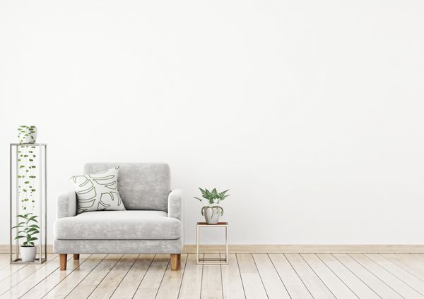 ماکت دیوار داخلی به سبک اسکاندیناوی با صندلی راحتی مخملی خاکستری بالش و گیاهان در پس زمینه دیوار سفید رندر سه بعدی