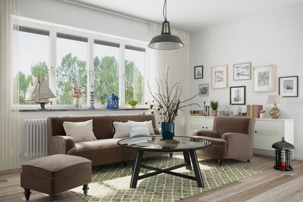 Skandinavisches nordisches Wohnzimmer mit einem Sofa Sessel und Deko
