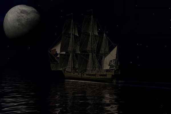 کشتی دزدان دریایی در حال حرکت در شب در ماه کامل