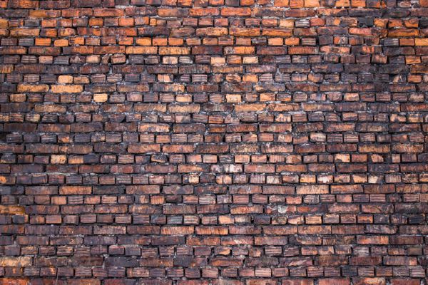 دیوار آجری قدیمی بافت گرانج برای پس زمینه سبک شهری