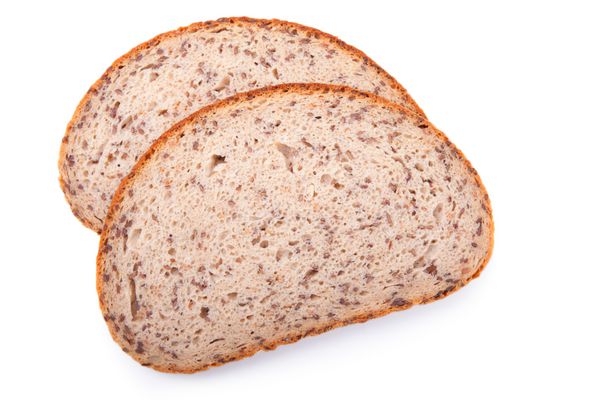 نان دانه ای جدا شده روی زمین سفید