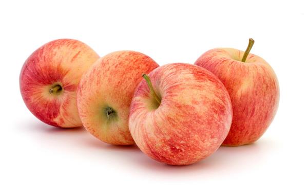 سیب سرخ جدا شده بر روی زمینه سفید