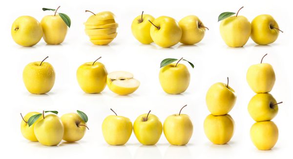 کامپوزیت سیب طلایی زرد جدا شده بر روی زمینه سفید