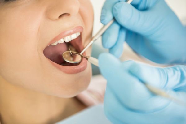 Dentist examining a patient