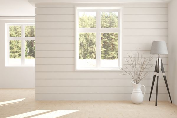 اتاق سفید با چراغ و چشم انداز سبز در پنجره طراحی داخلی اسکاندیناوی تصویر 3D