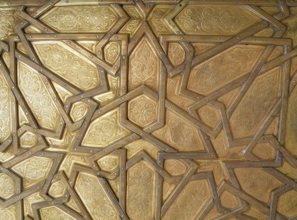 الگوی عربی زیبا از کاخ سلطنتی درب برنج در فاز مراکش پس زمینه الگوی