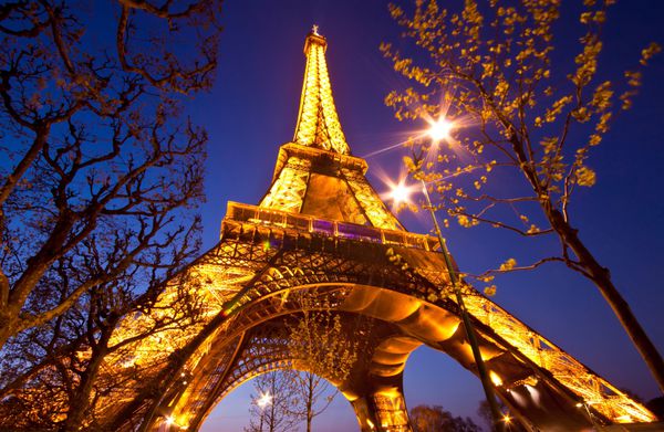 PARIS APR 20 Eiffel Tower Light Performance Show at dusk on April 20 2010 in Paris The tower was built as the entrance arch for the 1889 World