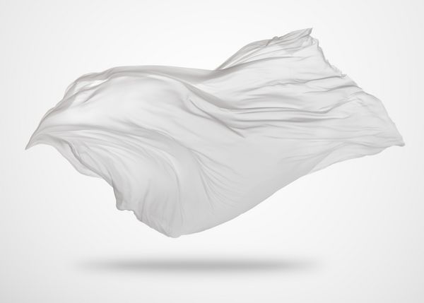 پارچه سفید شفاف صاف ظریف در پس زمینه خاکستری جدا شده است بافت پارچه پرواز