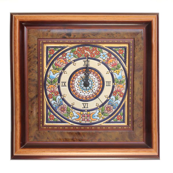 A beautiful wood style wall clock with brown yellow paint and colorful art texture details twelve o