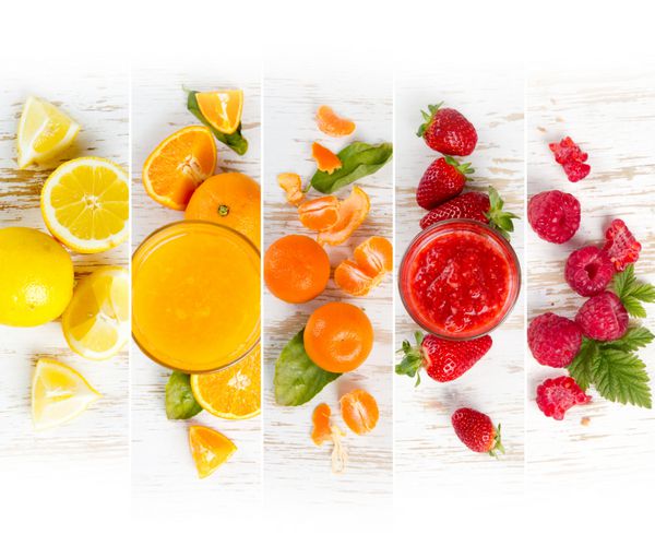 منظره ای از نوار های رنگارنگ رنگین کمان رنگی با میوه نوشیدنی ها و برش ها؛ مفهوم تغذیه سالم؛ فضای سفید برای متن