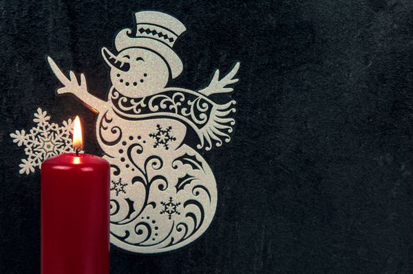 دکوراسیون کریسمس با آدم برفی و شمع