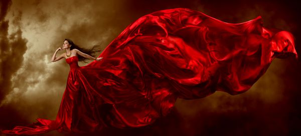 زن با رنگ قرمز لباس زیبا با پارچه پرواز
