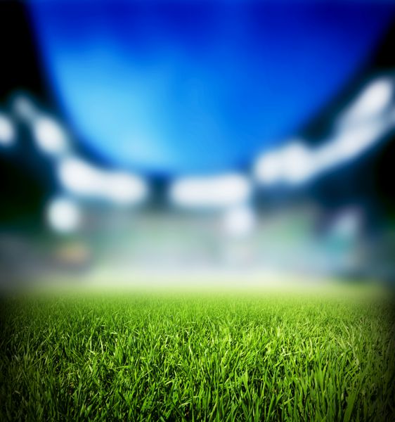 فوتبال بازی فوتبال چمن نزدیک است چراغ رویداد شب در ورزشگاه