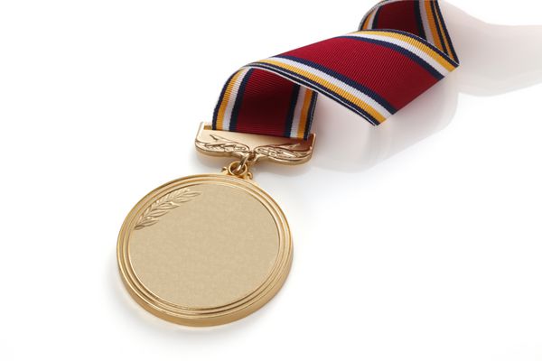 مدال طلا در پس زمینه سفید