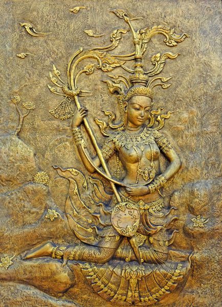 بومی فرهنگ مجسمه تایلندی در دیوار معبد