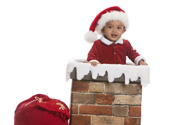بابا نوئل کودک شایان ستایش به عنوان سانتا Clause و در دودکش ایستاده است برای متن خود جدا از رنگ سفید است
