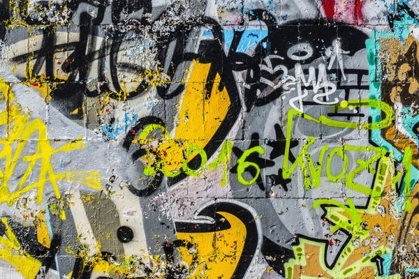 گرافیتی روی دیوار زیبا هنر انتزاعی خیابانی