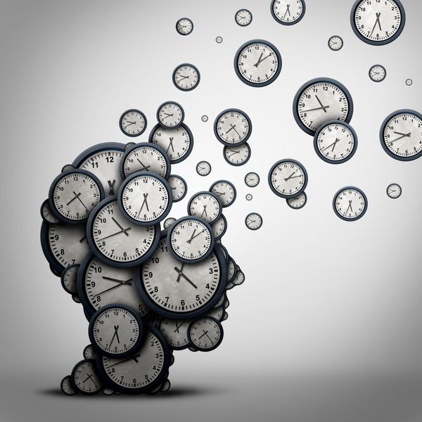 مفهوم کسب و کار زمان برنامه ریزی و یا صرف وقت دقیقه به عنوان یک گروه از ساعت به عنوان یک سر انسان به عنوان نماد سلامت برای روانشناسی یا برنامه ریزی فشار و زوال عقل یا پیری به عنوان یک تصویر 3D