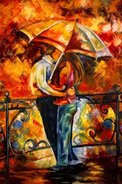 عاشقان دختر و پسری در باران زیر چتر