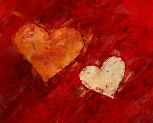 قلب نقاشی شده بر روی زمینه های قرمز
