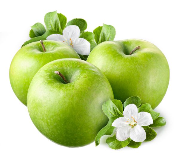 سیب های سبز با برگ و گل ها در زمینه سفید