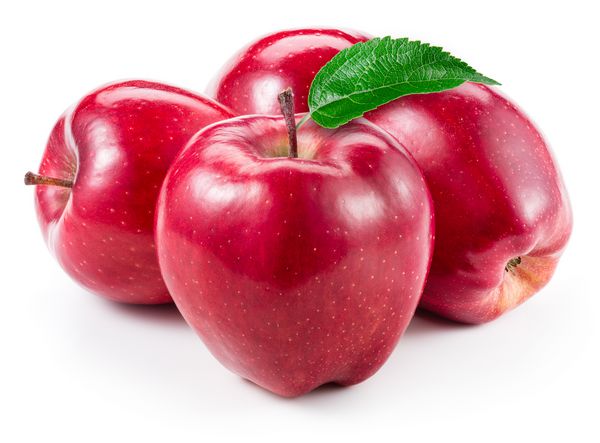 سیب های قرمز میوه با برگ جدا شده روی سفید