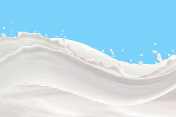 پاشیدن شیر در زمینه آبی