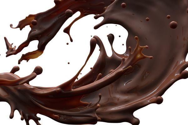 چاشنی قهوه قهوه ای یا شکلات جدا شده در پس زمینه سفید