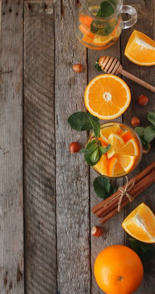 آب تزریق شده با سم زدایی با نارنجی نوشیدنی سالم مفهوم رژیم غذایی غذایی تمرکز انتخابی