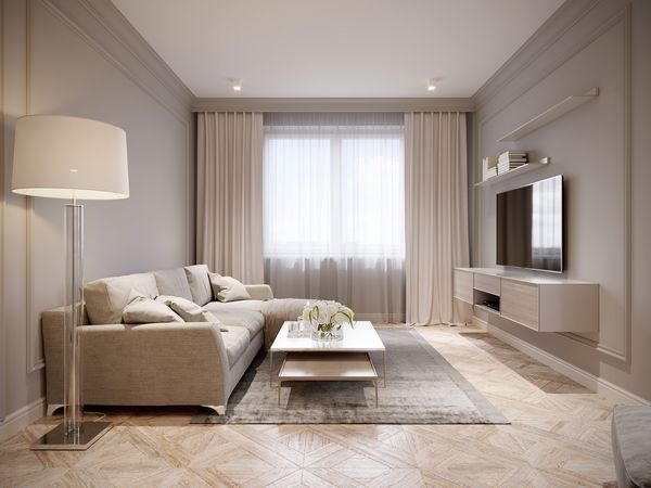 طراحی داخلی اتاق نشیمن خاکستری بژ مدرن با مبل های بزرگ بژ روشن و پرده های سفید بژ رندر سه بعدی