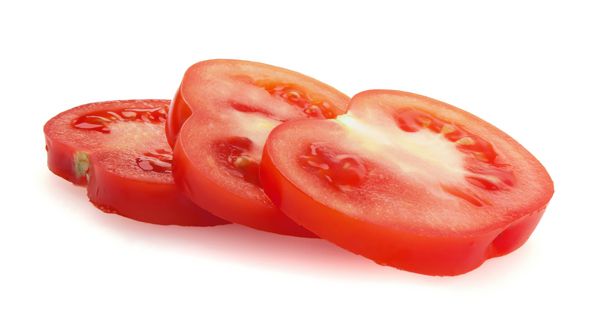 برش گوجه فرنگی جدا شده روی سفید