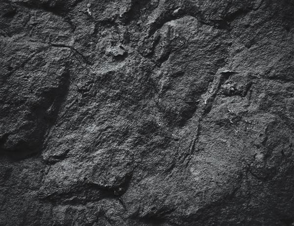 سطح دیواره سنگ غار زمینه بافت سنگ خاکستری
