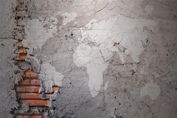 نقشه جهان گرانج در زمینه بافت دیوارهای سیمانی ترک خورده
