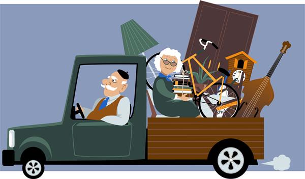 زوج مسن سوار بر کامیون که وسایل خود را جابجا می کنند
