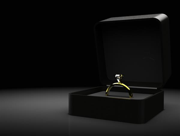 نامزدی حلقه ازدواج الماس طلا در جعبه مخملی با فضای چاپی نشسته است