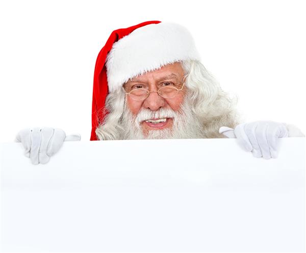 بابانوئل با یک بنر کریسمس که روی سفید جدا شده است