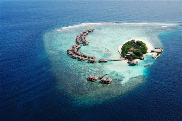 جزیره گرمسیری کوچک نمایی از هواپیمای دریایی مالدیو اقیانوس هند