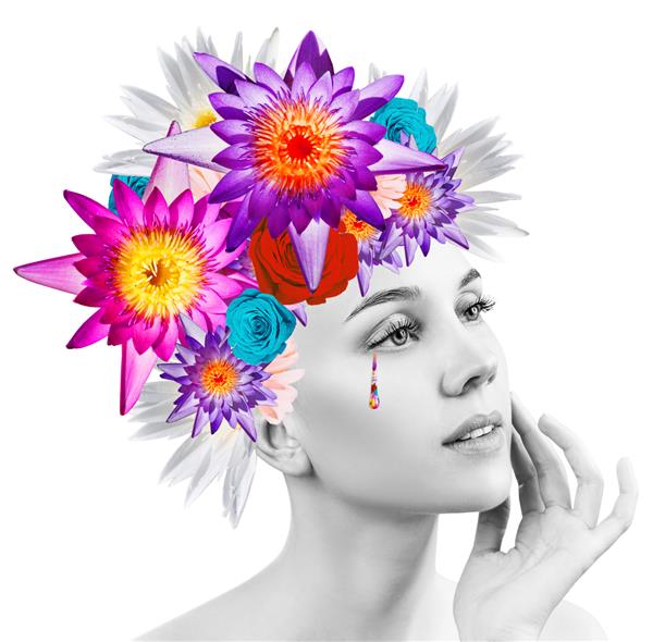 زن زیبا با گلهای شکوفه بر سرش