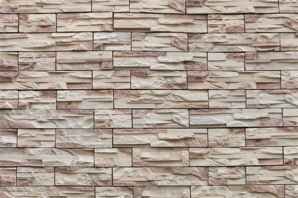 نمای نزدیک از یک دیوار آجری سفید پس‌زمینه بافت سنگی مدرن